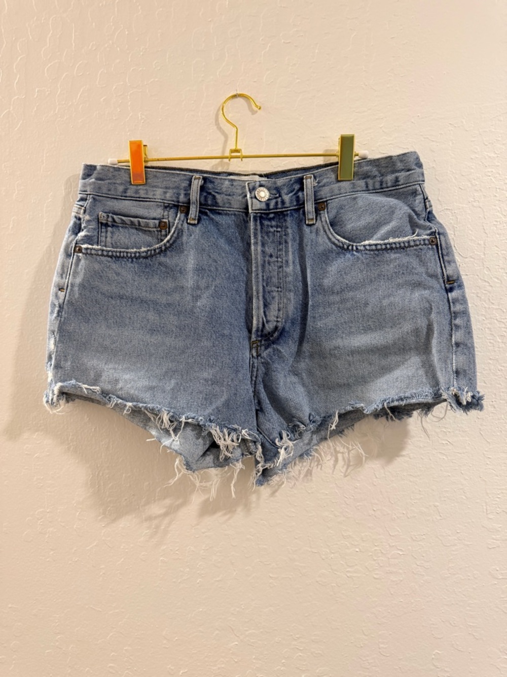 AGOLDE Washed Light Blue High-Rise Frayed Denim Shorts